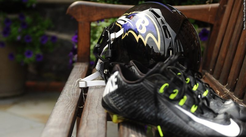 Ravens cleats and helmet
