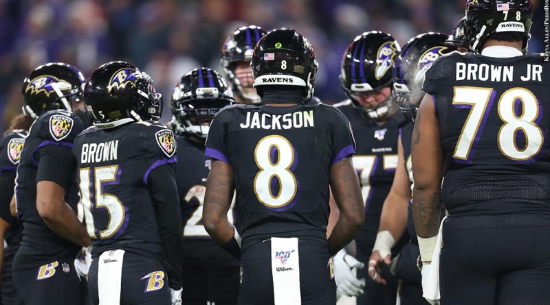 Ravens huddle with Lamar Jackson