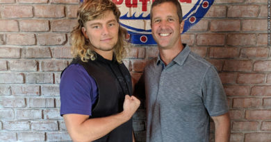 Brian Pillman Jr. and John Harbaugh