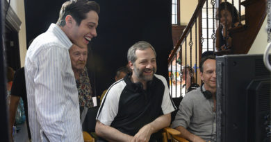 Pete Davidson and director Judd Apatow with crew members on the set of "The King of Staten Island."