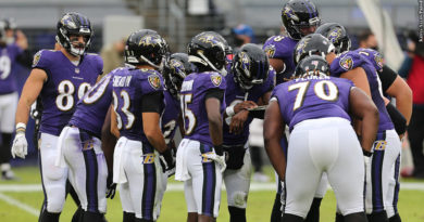 Ravens huddle