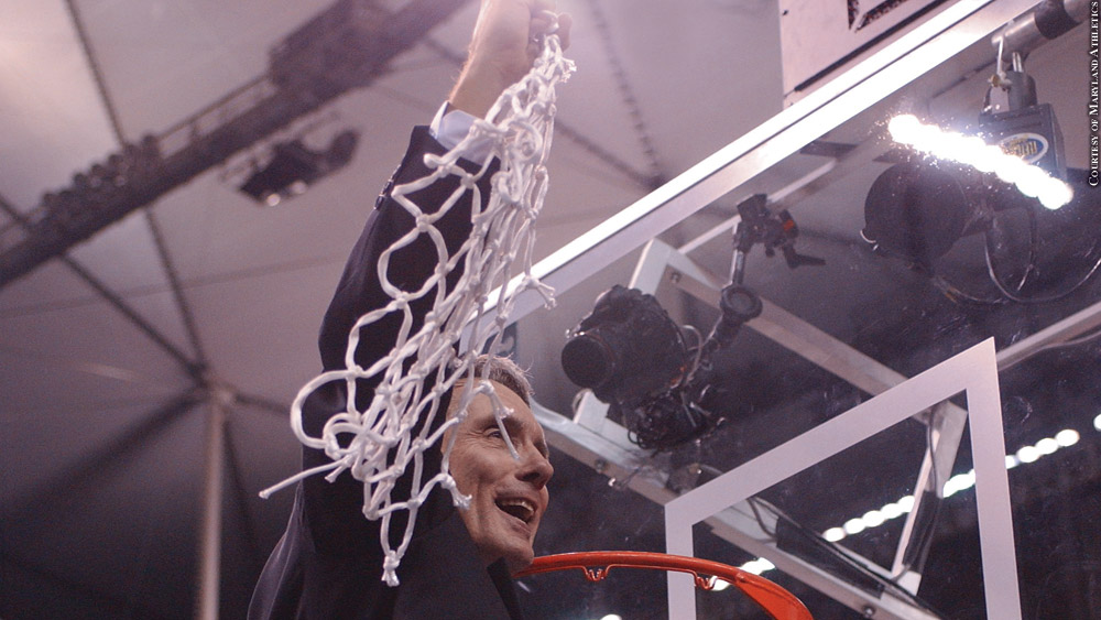 Gary Williams cuts down net after national championship