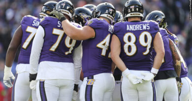 Ravens huddle