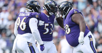 Broderick Washington, Kyle Van Noy, Michael Pierce