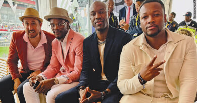 Randall Lane (far left) and Kai Cunningham (far right) meet Lamar Jackson at the Preakness in May