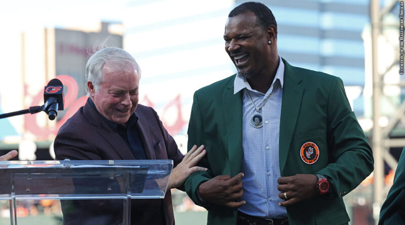 Buck Showalter and Adam Jones